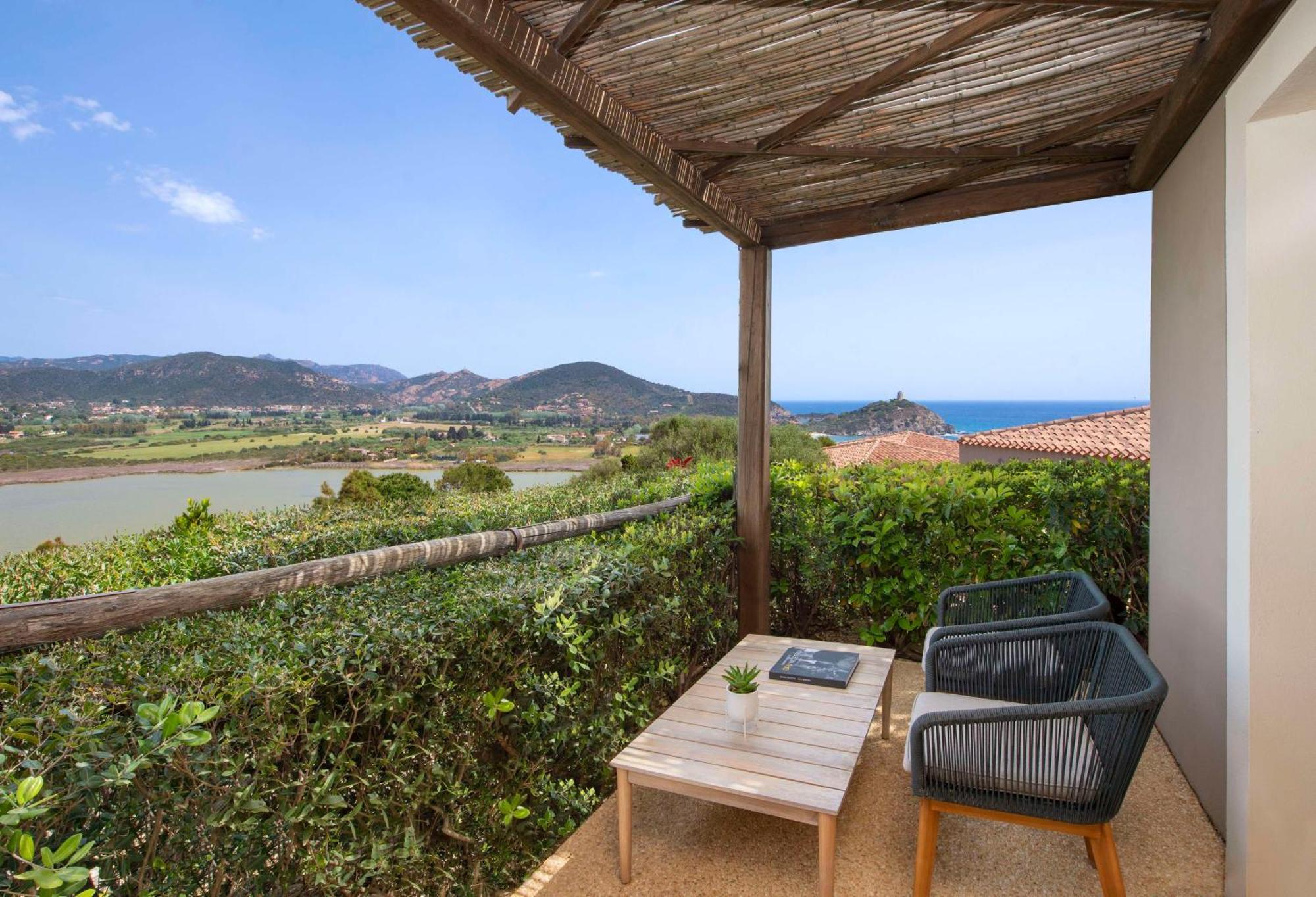 Baia Di Chia Resort Sardinia, Curio Collection By Hilton Buitenkant foto