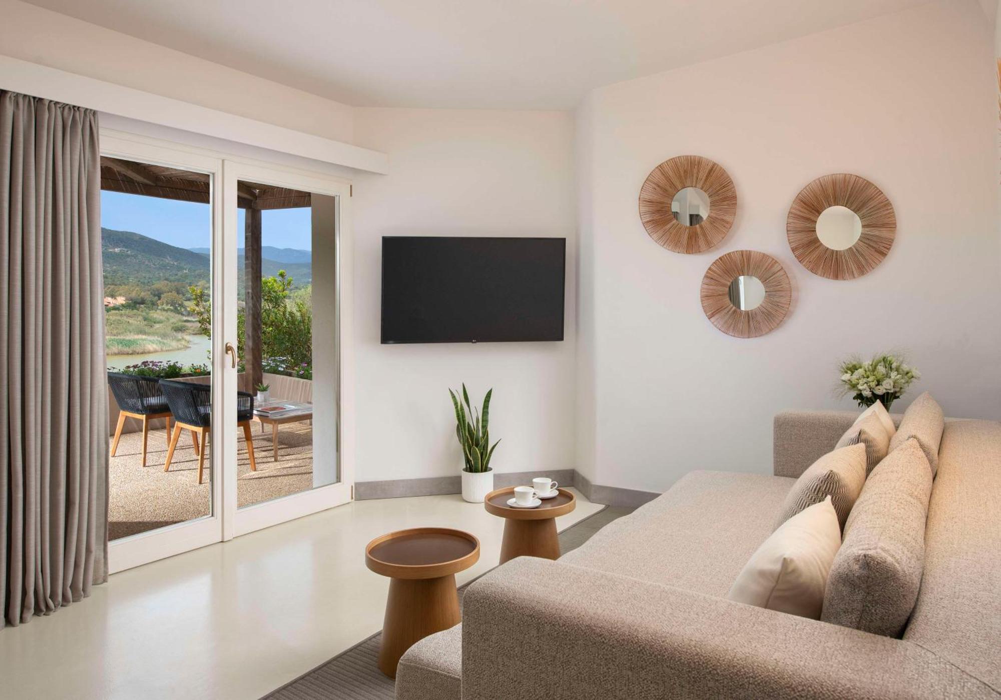 Baia Di Chia Resort Sardinia, Curio Collection By Hilton Buitenkant foto