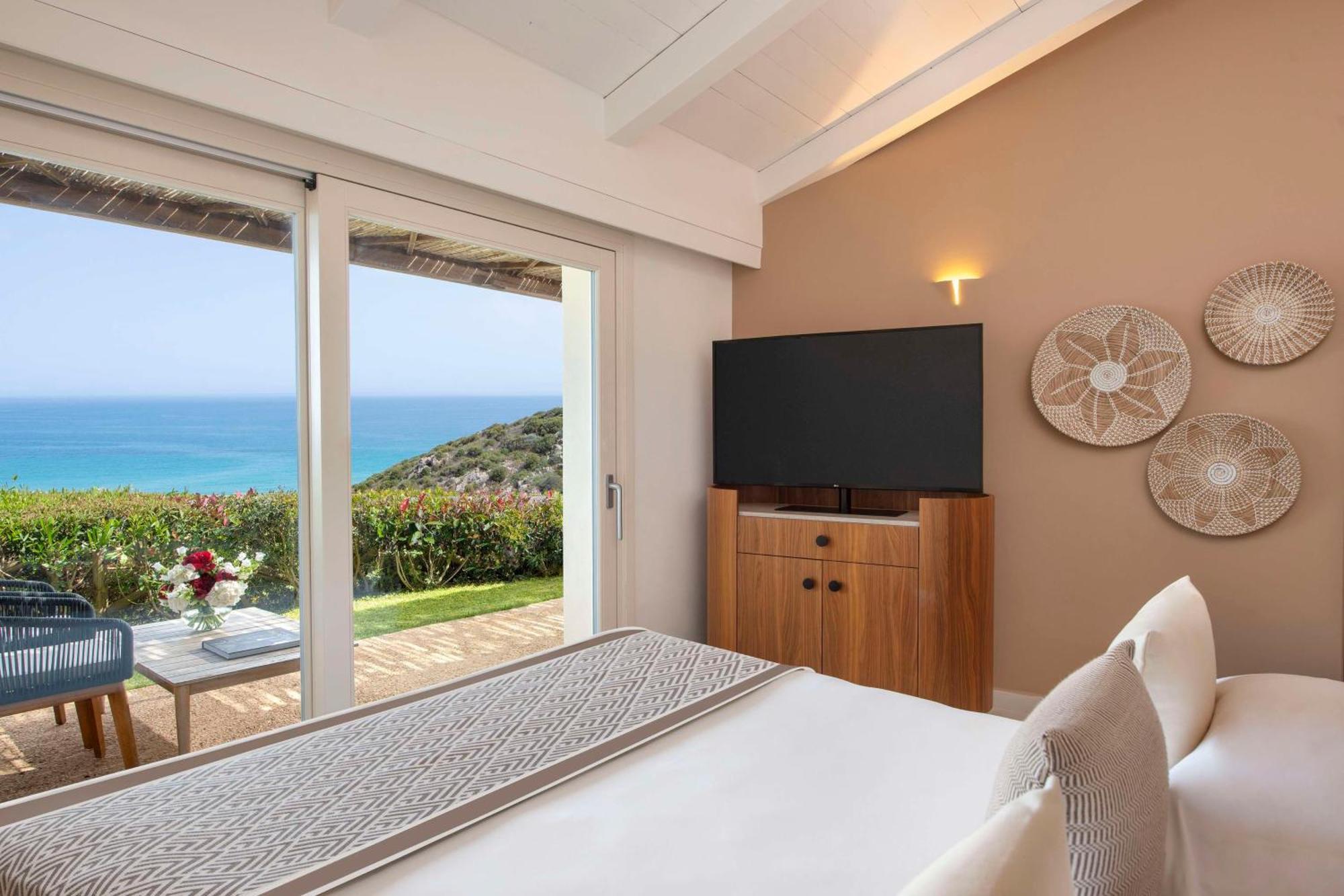 Baia Di Chia Resort Sardinia, Curio Collection By Hilton Buitenkant foto